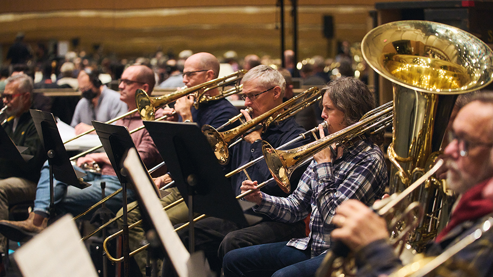 Orchestra members at a rehearsal for MADDADDAM.