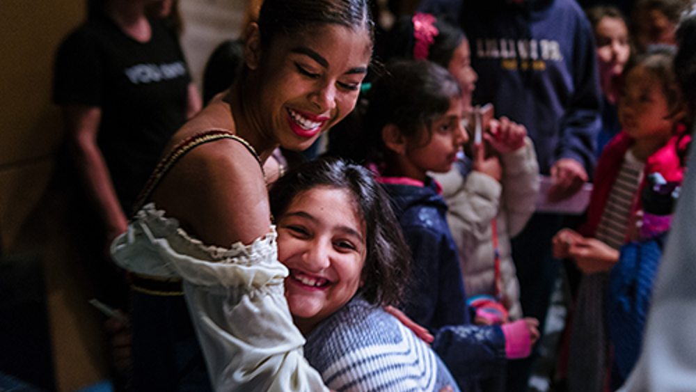 Tene Ward with YOU dance audience members.