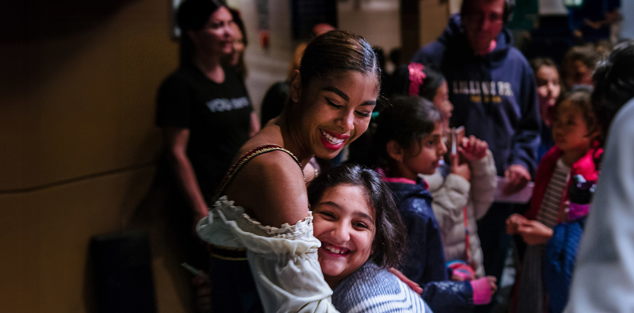 Tene Ward with audience members at a YOU dance performance