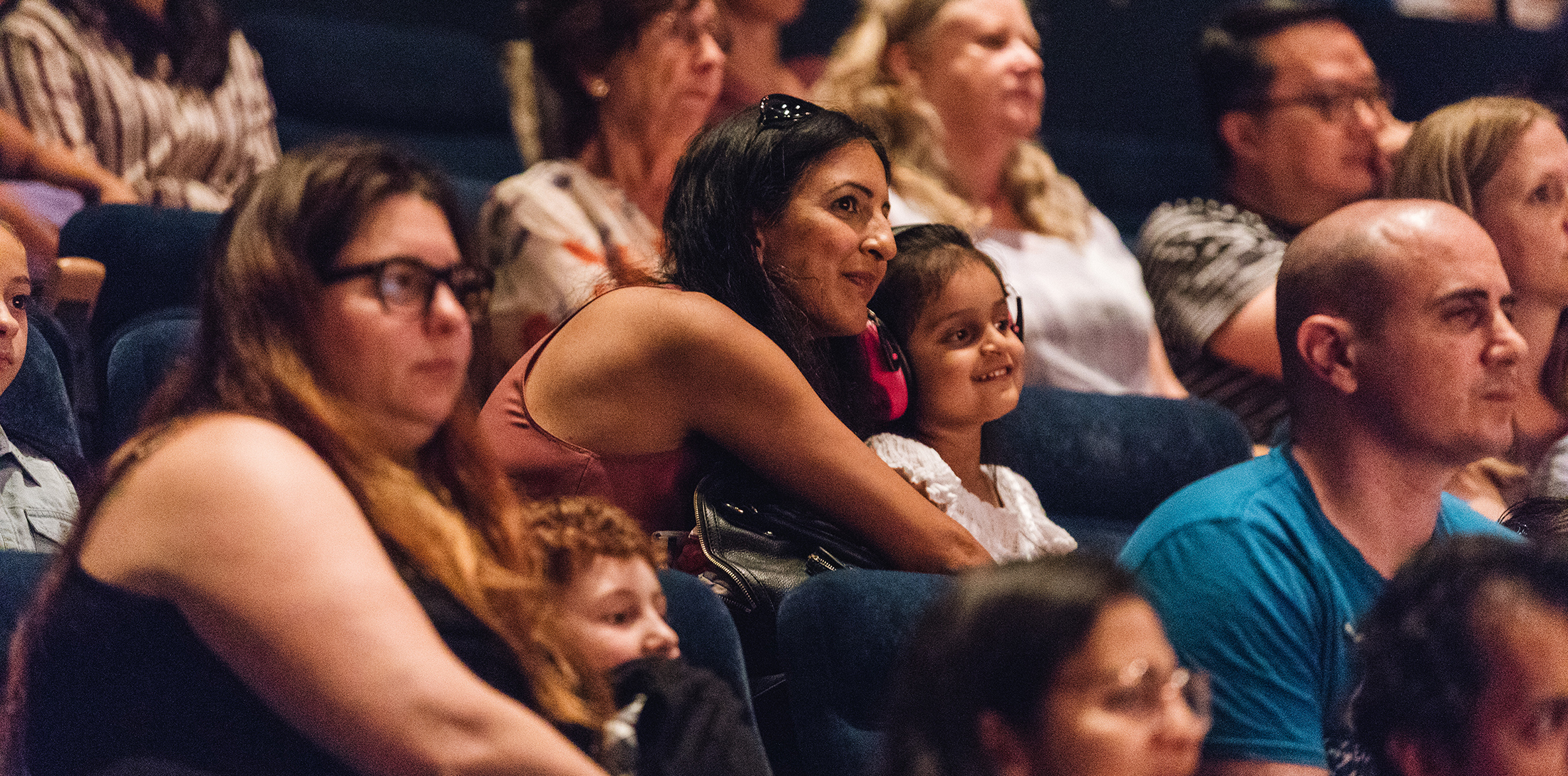 Audience members at a YOU dance performance